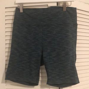 Outdoor voices bike shorts in green spacedye